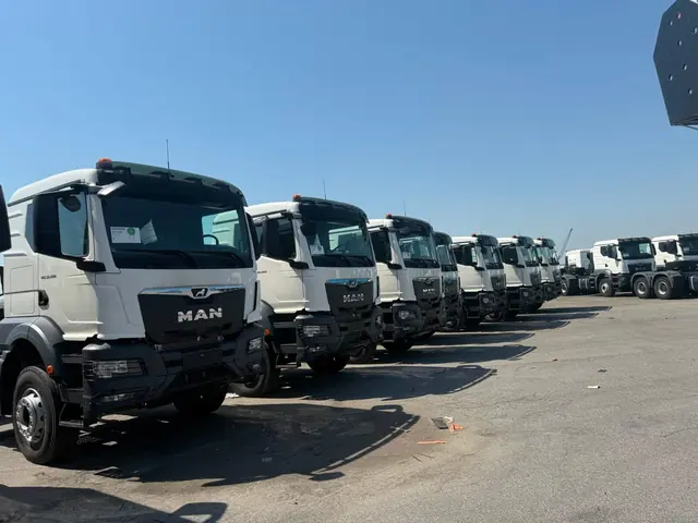 MAN heavy trucks lined up for delivery