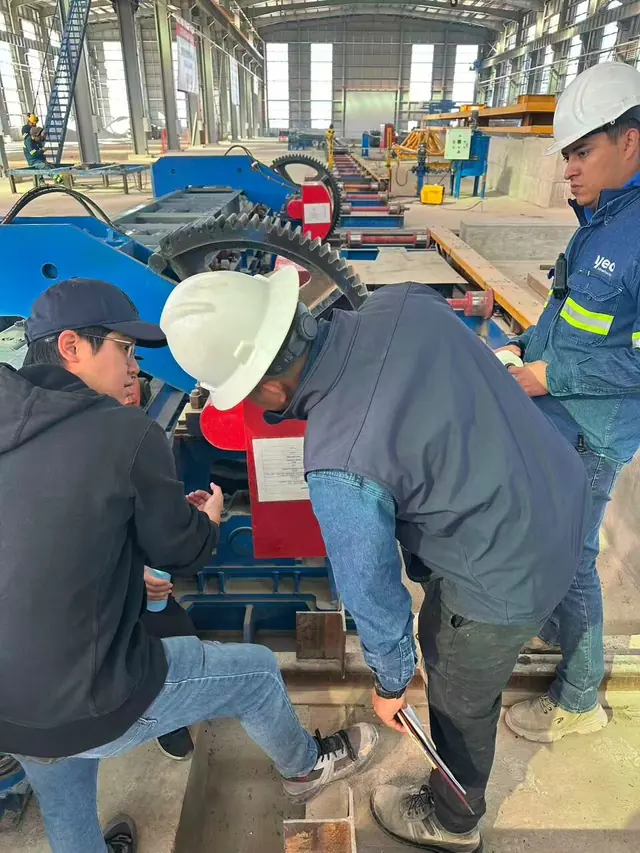 Technicians commissioning machinery